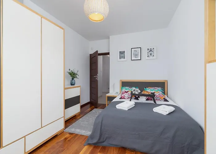 Kraków Błonia Apartment with Balcony by Renters